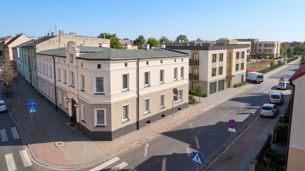 Działka inwestycyjna z kamienicą i projektem mieszkań w centrum Kościana